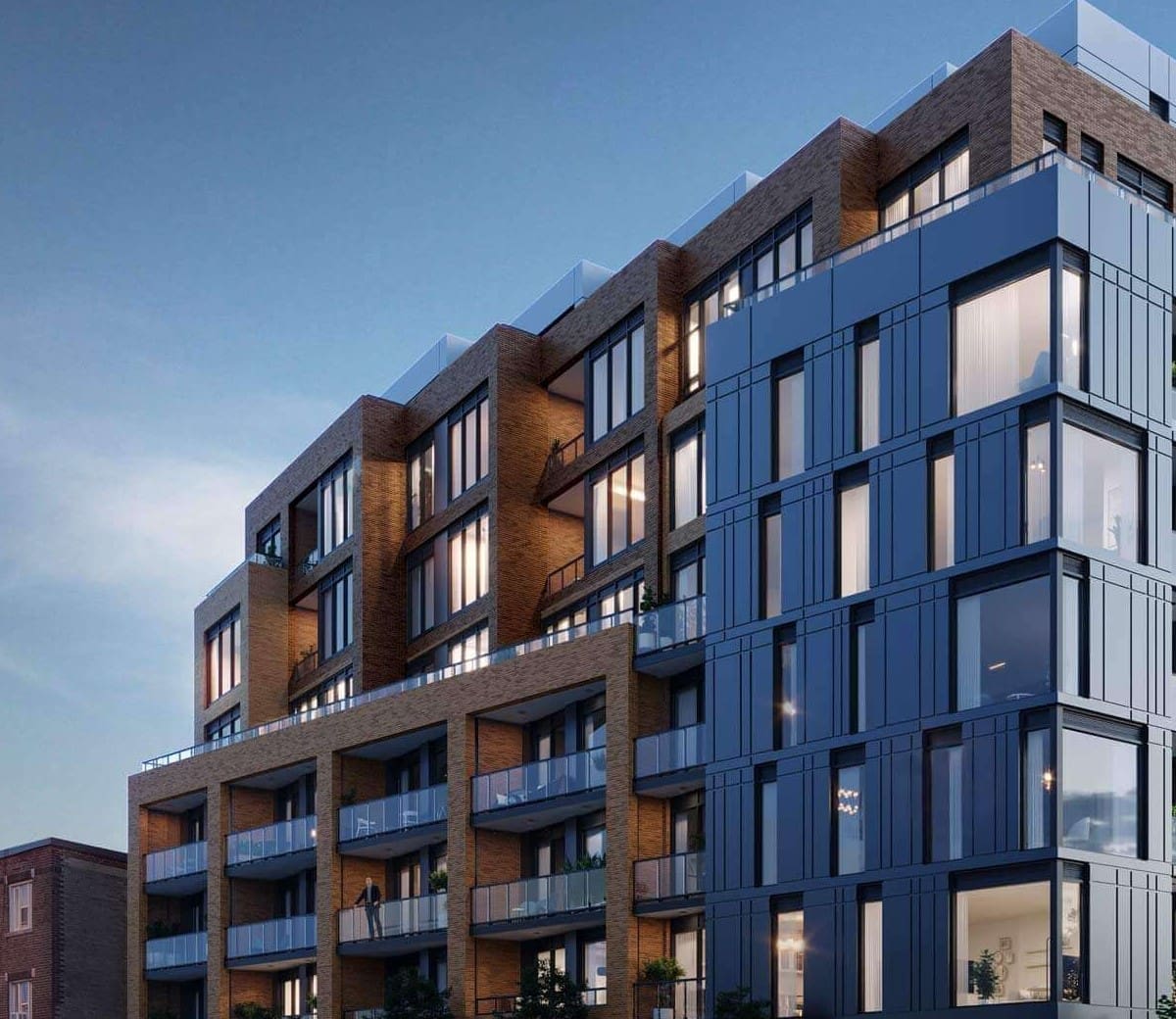 "La résidence Courcelette est un immeuble moderne de plusieurs étages dont l'extérieur est constitué d'un mélange de briques et de verre. Dotée de grandes fenêtres et de balcons